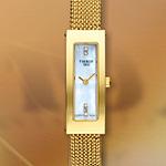 часы Tissot. T-Gold